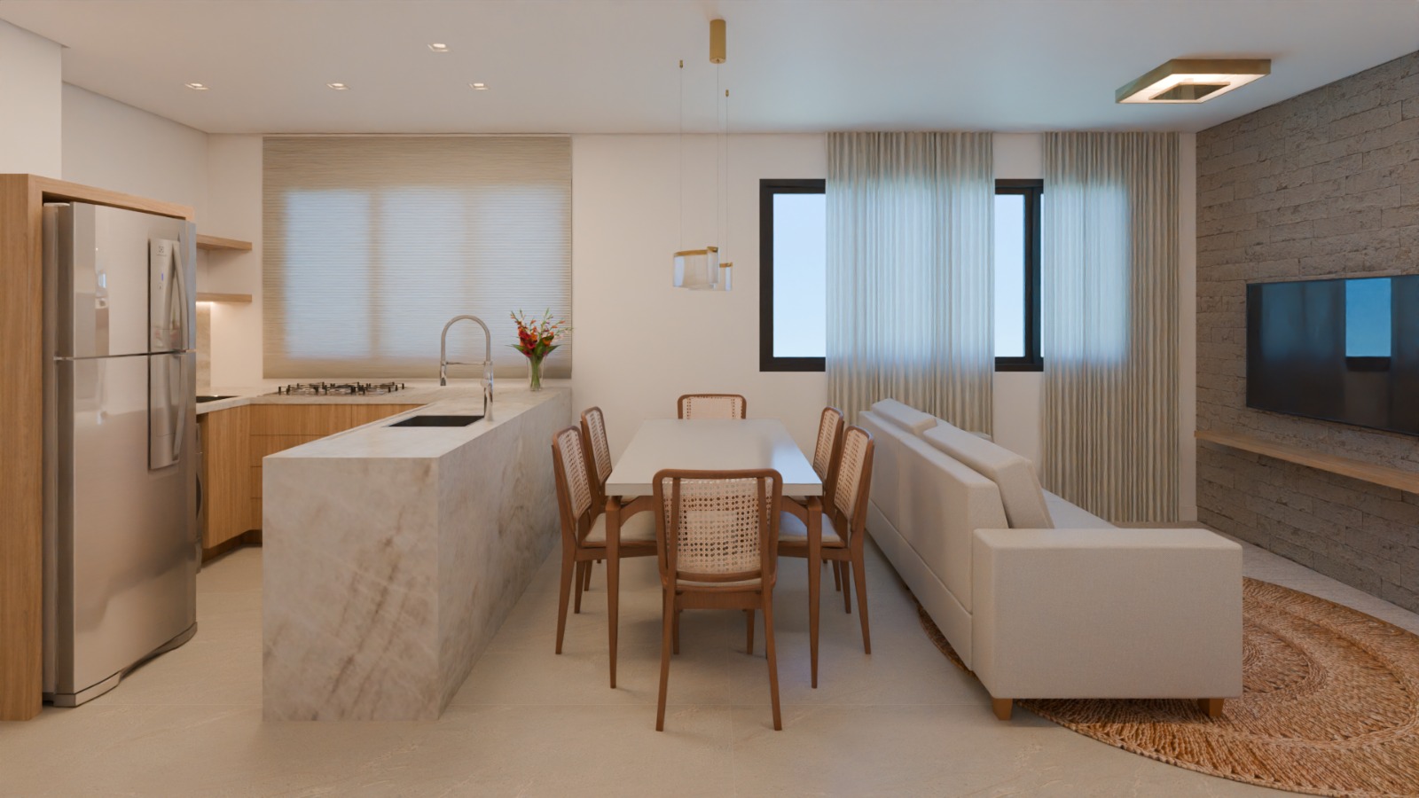 Cozinha conjugada com sala estar.